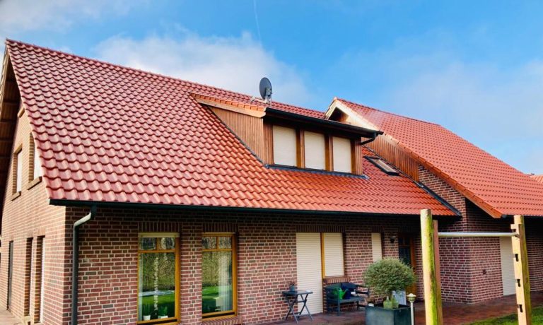 Wertsteigerung durch professionelle Dachreinigung vor Hausverkauf